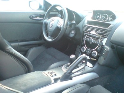 petite phot avant modif du double din, mais tu vois le cendrier et le cache poignée d'ouverture de porte.